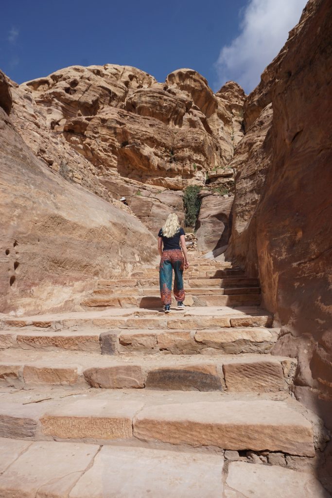 climbing up to the Monastery in Petra, Jordan